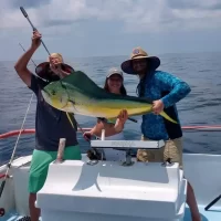 Catch It Fishing Charters & Tours Header Image of the a family holding fresh caught marlin from a fishing trip | Catch It Fishing Charters & Tours in Panama City Beach offers family friendly, deep sea fishing trips ranging from 3 hours to 12 hours, and dolphin tours and sightseeing boat tours along the Gulf Coast.
